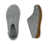 Grey slippers with brown soles on a white background