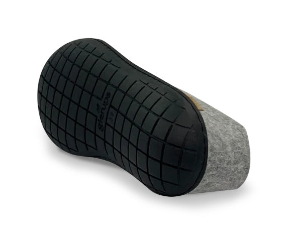 Grey and black foot massager on a white background